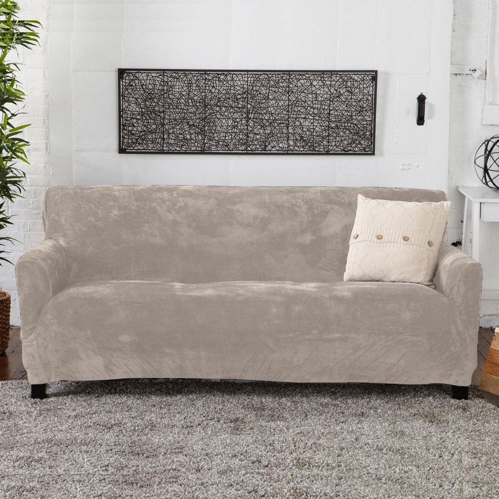 Solid black velvet form fit stretch slipcover for couch from the Gale Collection at Great Bay Home