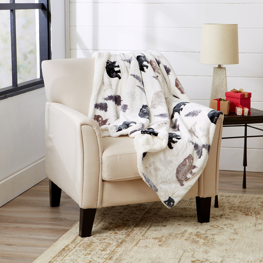 chair covered in blanket from great bay home