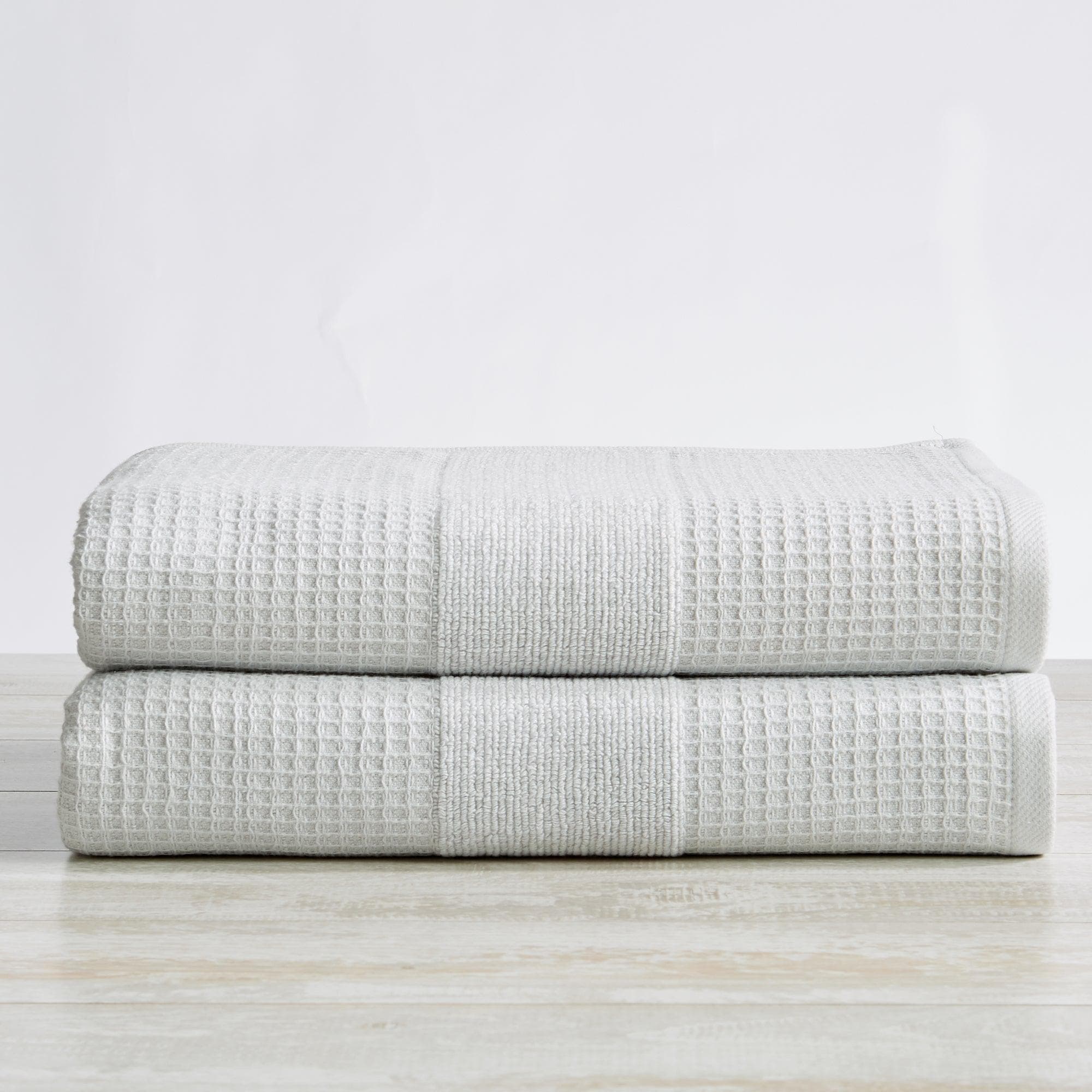 https://greatbayhome.com/cdn/shop/products/great-bay-home-2-pack-waffle-weave-bath-towels-soleia-collection-34930724438191.jpg?v=1661202442