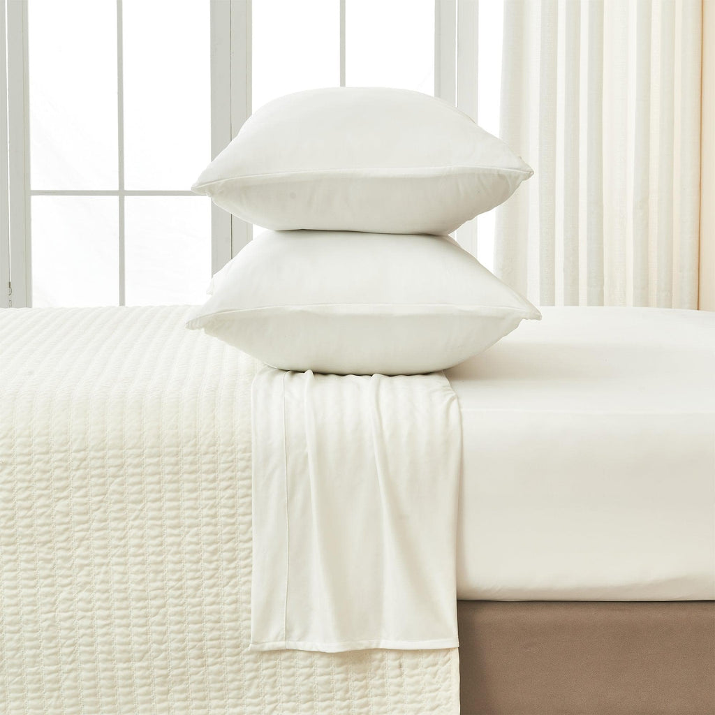 Great Bay Home Twin / Alpine White 4-Piece Interlock Microfiber Sheet Set - Mackenna Collection Fall asleep in sheets that will wrap you up in luxurious softness. This sheet set is uniquely woven to offer a flexible feel while still keeping that lightweight microfiber feel. These breathable sheets will keep you comfortable and cozy all year long. These solid colors will match your bedroom decor effortlessly!