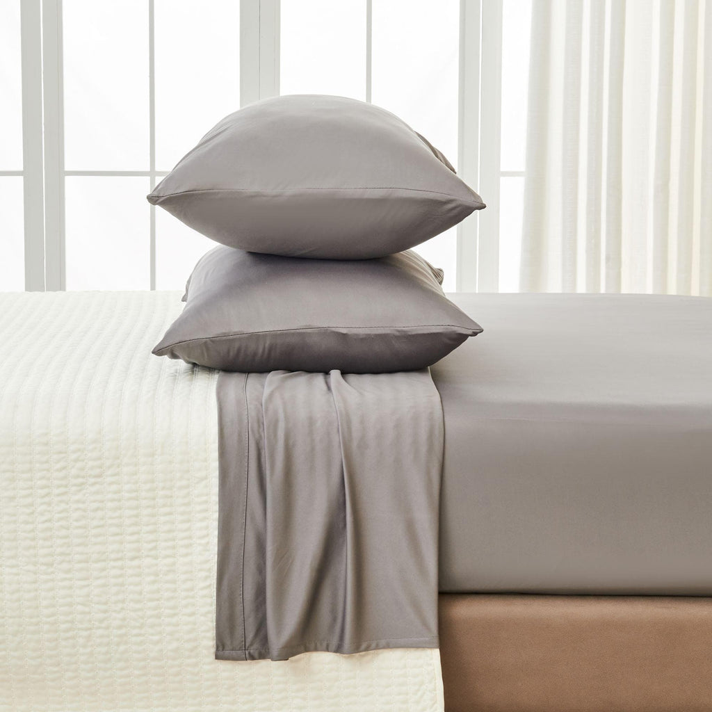 Great Bay Home Twin / Graphite 4-Piece Interlock Microfiber Sheet Set - Mackenna Collection Fall asleep in sheets that will wrap you up in luxurious softness. This sheet set is uniquely woven to offer a flexible feel while still keeping that lightweight microfiber feel. These breathable sheets will keep you comfortable and cozy all year long. These solid colors will match your bedroom decor effortlessly!