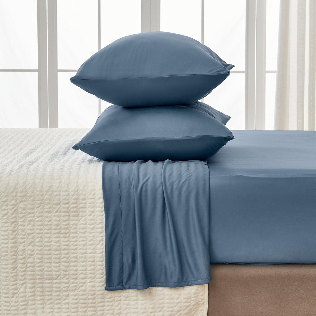 Great Bay Home Sheets Twin / Oceana 4-Piece Interlock Microfiber Sheet Set - Mackenna Collection Fall asleep in sheets that will wrap you up in luxurious softness. This sheet set is uniquely woven to offer a flexible feel while still keeping that lightweight microfiber feel. These breathable sheets will keep you comfortable and cozy all year long. These solid colors will match your bedroom decor effortlessly!